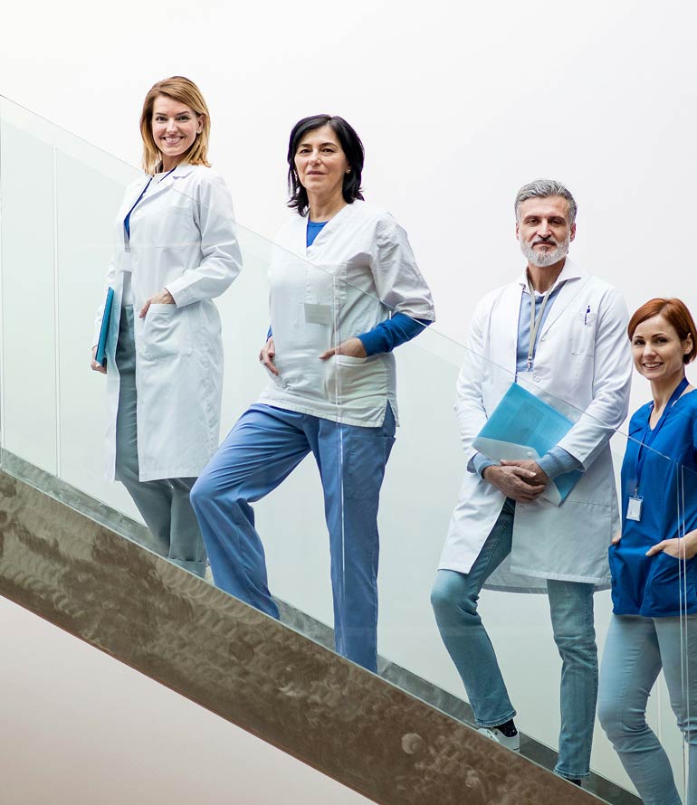 Leeds Limb Centre doctors standing on steps